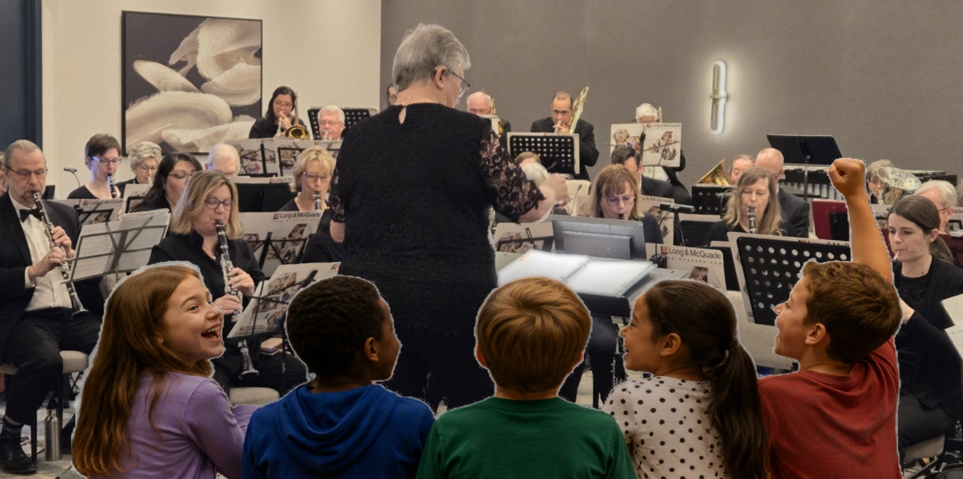 children cheering in front of the band
